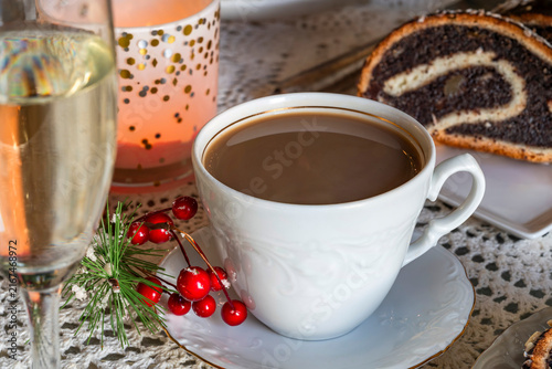 Christmas coffee with poppyseed cake and champagne