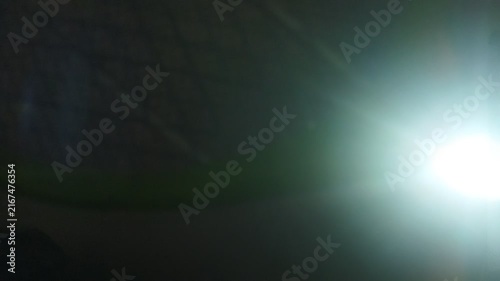Cinematic Spotlight Beam with Dreamy Glow, Mysterious Dark Bokeh and Luxury Light Motion