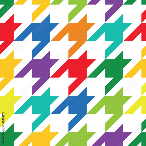 Premium vector of colorful houndstooth seamless pattern. Bright multicolor background texture with geometric vibrant geometric shapes and abstract repeat fabric for trendy wrapping paper print