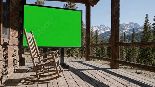 Green Screen Television on Rustic Log Cabin Porch with Mountain View