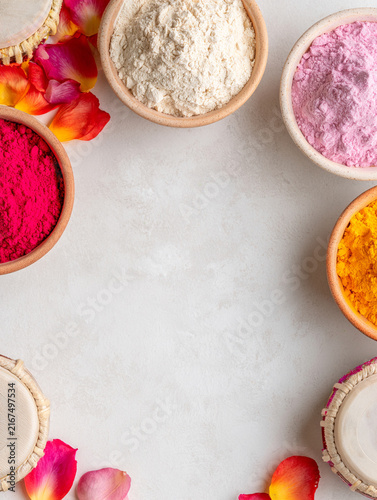 Colorful Holi Festival Powders and Drums on White Background