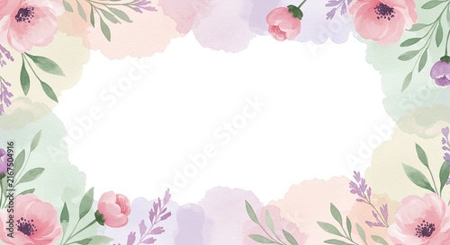 Soft pink peony flowers in a delicate white vase with green stems.