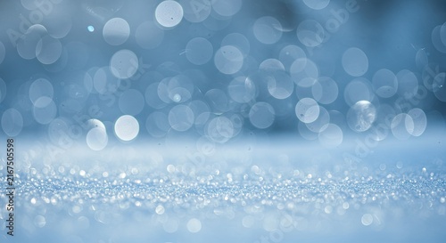 Close-up of soap bubbles floating on a water surface.