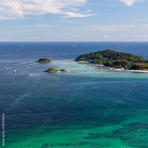 Fotografie Aerial view of Koh Adang island and smaller rocky islets in the turquoise waters off the coast
