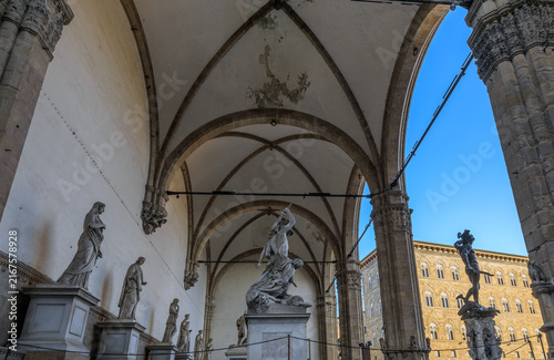 Townscape of Florence, Italy: the Loggia della Signoria with the sculpure of Rape of Polyxena in the center, on the right the Perseus with the Head of Medusa.