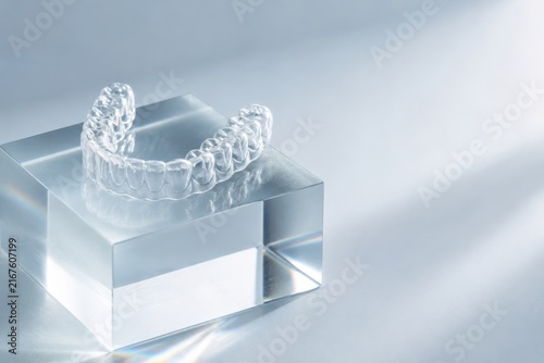 Clear Orthodontic Aligner on Glass Block With Copy Space