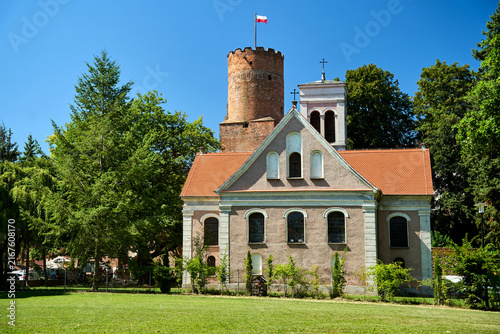 Bild auf Leinwand Historic parish church and medieval tower of the Knights of St