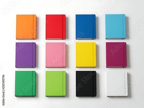 Set of colorful notebooks with blank covers arranged in a grid for school office and creative work