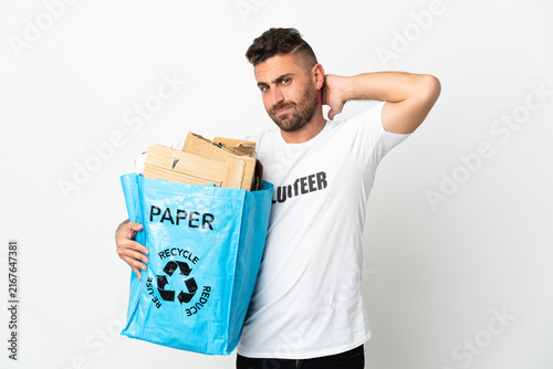 Quadro su tela Caucasian man holding a recycling bag full of paper to recycle isolated on white