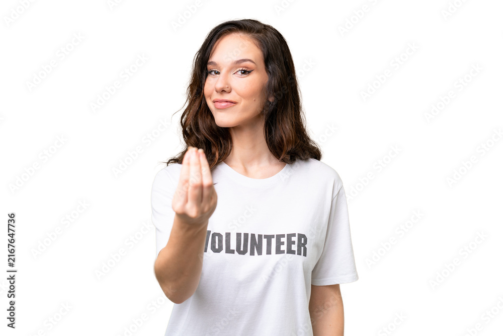 Naklejka premium Young volunteer caucasian woman over isolated background making money gesture