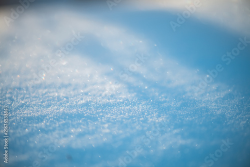 Obraz na plátne Freshly fallen snow creates a bright winter background with countless sparkling
