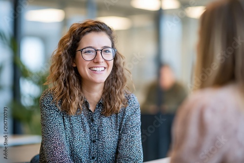 Recruiter Conducts Friendly Interview With Confident Candidate in Bright Meeting Room