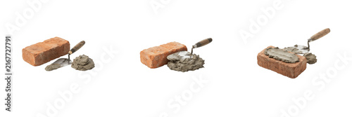 Bild auf Leinwand Bricklaying trowel spreading mortar on a red clay brick isolated on white backgr
