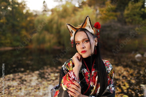 Japanese Kitsune Fantasy Woman in Kimono and Fox Ears - Autumn Park