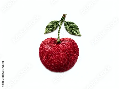 Vibrant red tomato with green stem and leaves., cooking, nutrition