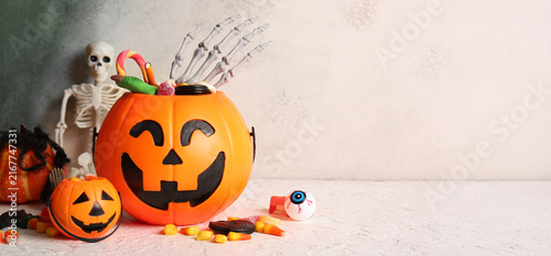 Fotografie Halloween celebration and trick or treat concept, pumpkin buckets filled with ca