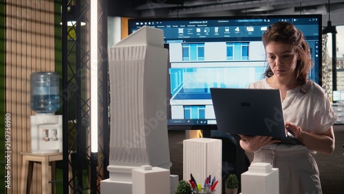 фотографія Property developer analyzes zoning regulations and project plans, preparing a master plan for sustainable housing aligned with smart city infrastructure growth