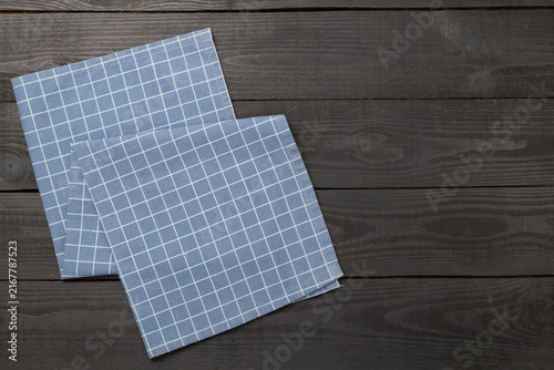 Bild auf Leinwand Kitchen napkin on wooden background, top view