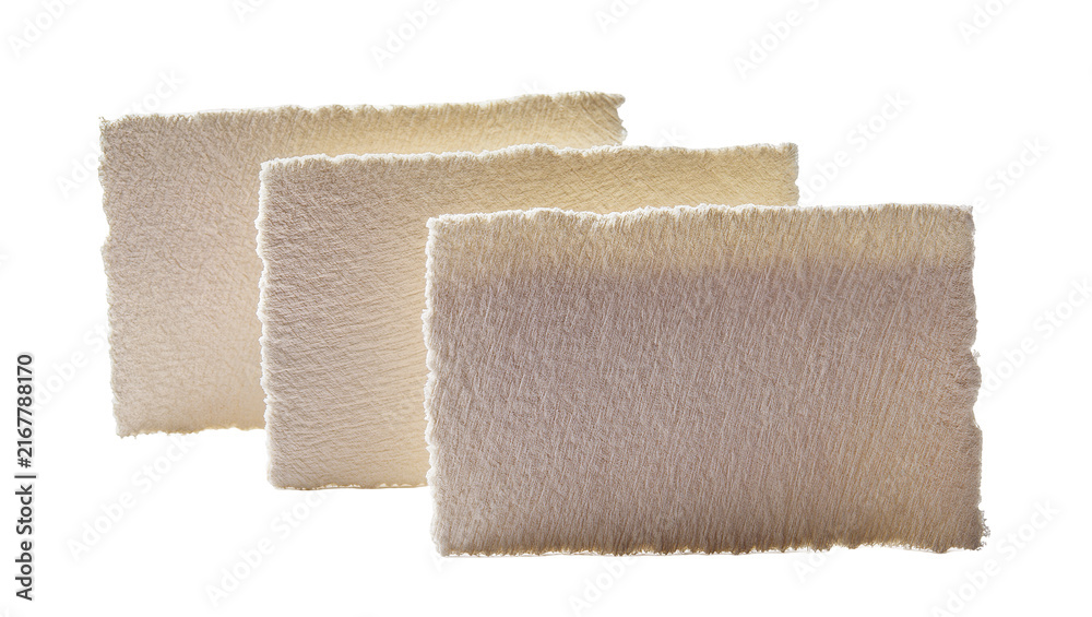 Obraz premium Three textured handmade paper sheets with torn edges, isolated on transparent background