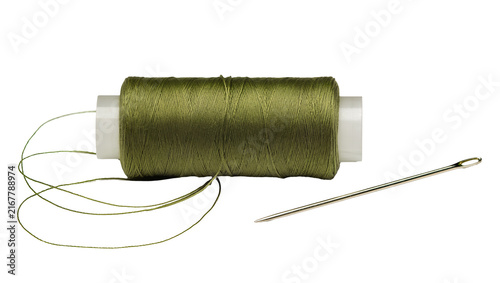 Fotografía Olive green thread spool with needle, isolated on transparent background