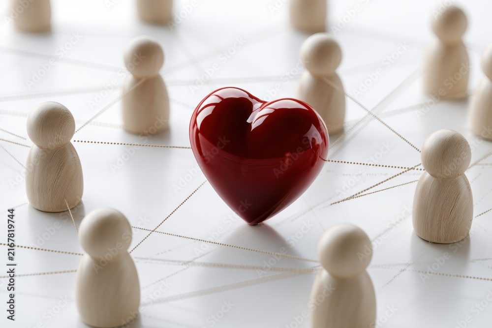Obraz premium Glossy red heart surrounded by wooden human figures connected with fine strings symbolizing interconnectedness empathy and emotional bonds in a network