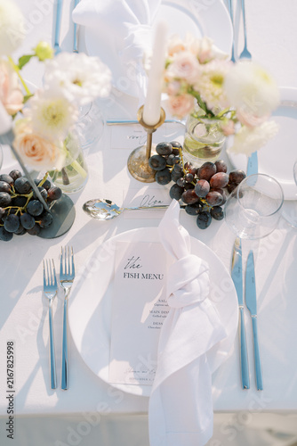 Elegant Table Setting with Fish Menu
