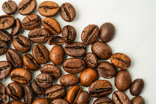 The texture of roasted coffee beans from above is soft light, selected coffee