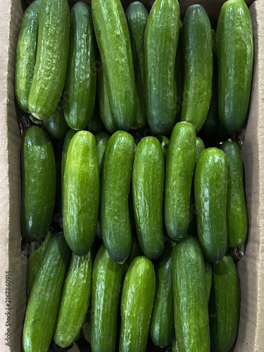 Box of small cucumbers, gherkins, used for pickling