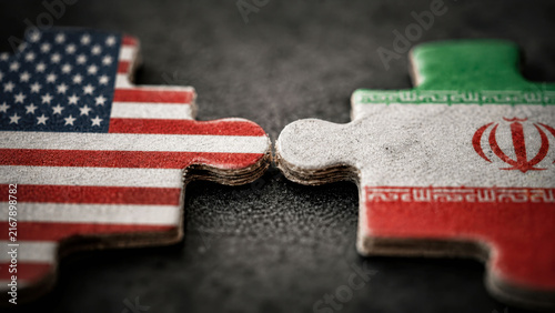 Incompatible USA and Iran Puzzle Pieces Symbolizing Political Conflict