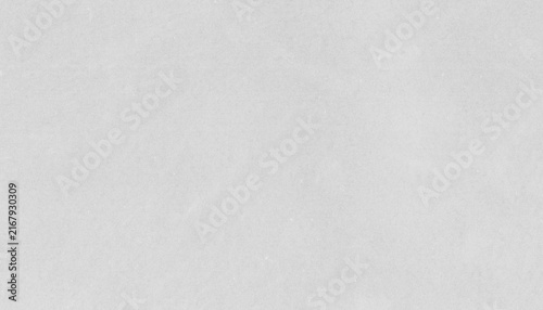 White paper texture with fine grain, subtle fibers and a uniform matte finish. Neutral minimal background with ample copy space for text and design.