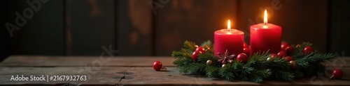 Two burning candles illuminate an antique wooden table and Advent wreath , antique, spirituality
