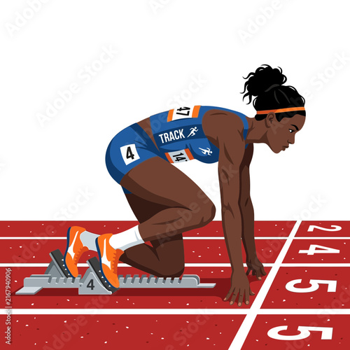 African American female sprinter in starting blocks preparing for a race on athletics track