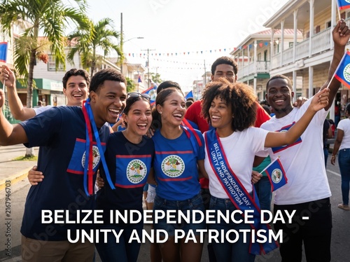 Group of diverse young students celebrating belize independence day outdoors wearing blue and white t-shirts with national flag emblems and waving small flags in a sunny street parade