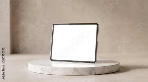 Modern laptop on marble pedestal in warm beige room with wavy textured wall and natural light.