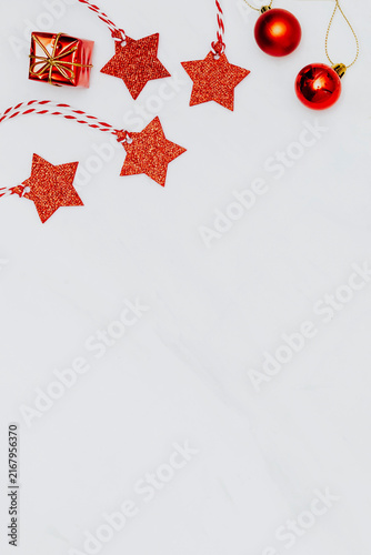 Fotografie Red star on white marble background