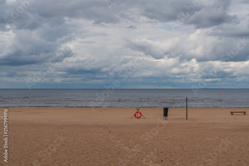 A deserted sandy beach on the Baltic Sea coast on a sunny summer day, Sestroretsk, Kurortny District, Saint Petersburg, Russia