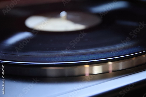 Obraz na płótnie Close-Up of Grooves on Spinning Vinyl Record