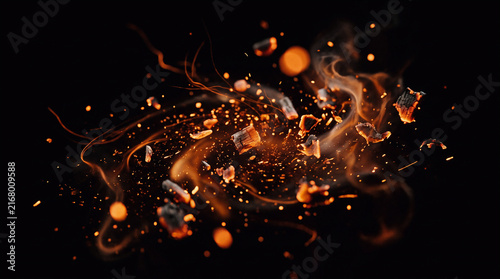 glowing campfire sparks, flying embers, and suspended incandescent particles isolated against a pure deep black background
