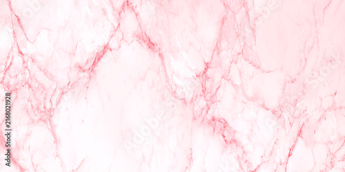 Light pink marble texture with intricate darker veining patterns, stone surface background