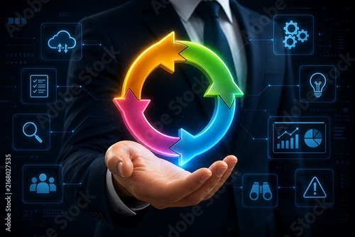 Businessman holding colorful circular arrows with digital icons in background