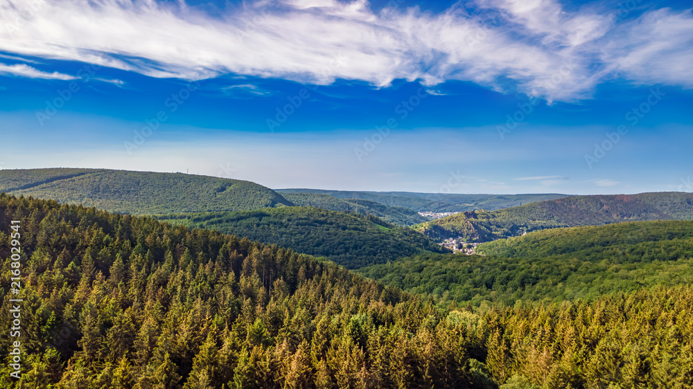 Fototapeta premium Aerial drone view of Ardennes mountains nature landscape from above, hills and green forest on summer