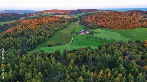 Aerial Drone View of Rural Valley, Forests, and Fields at Sunset