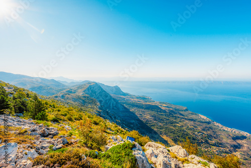 Panoramic view from Skywalk Biokovo glass platform overlooking Makarska Riviera, Adriatic sea and islands, Biokovo Nature Park, Croatia.