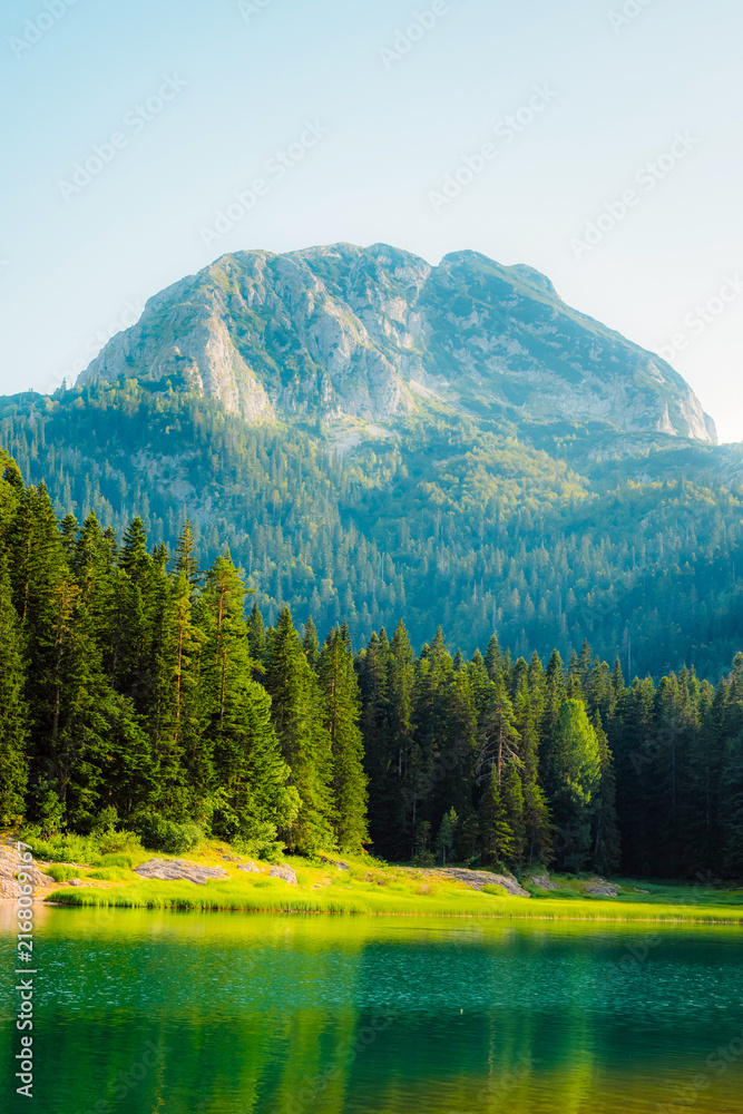 Obraz premium Black Lake (Crno Jezero) with the majestic Medjed peak in the background, Durmitor National Park, Montenegro.