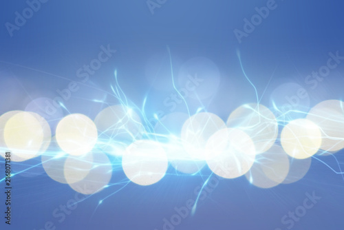 Abstract background of light blue shades with glare and bokeh effect.