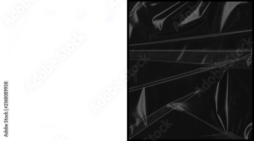 Cuadro en lienzo Crumpled black plastic texture, wrinkled polyethylene film background, dark glos