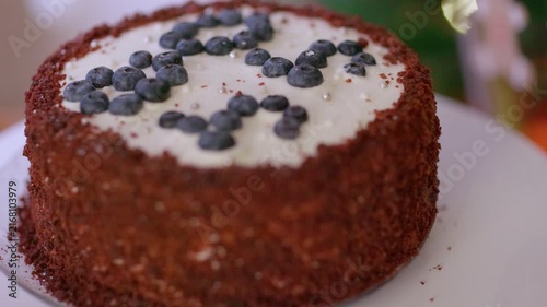 Delicious Red Velvet Cake with Cream Cheese Frosting and Blueberries