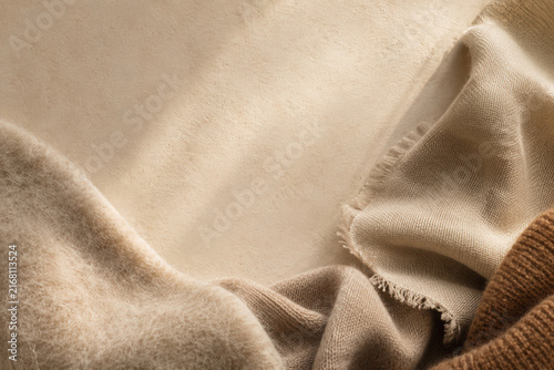 Soft beige fabric draped in gentle folds