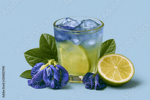 Delightful Refreshing Drink with Blue Butterfly Pea Flowers and Lime: A Beautifully Presented Beverage Perfect for Summer Gatherings and Parties