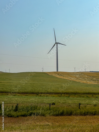 Wind turbines on Saskatchewan prairie farmland, Canada